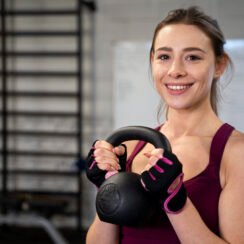person-sport-gym-using-kettlebells